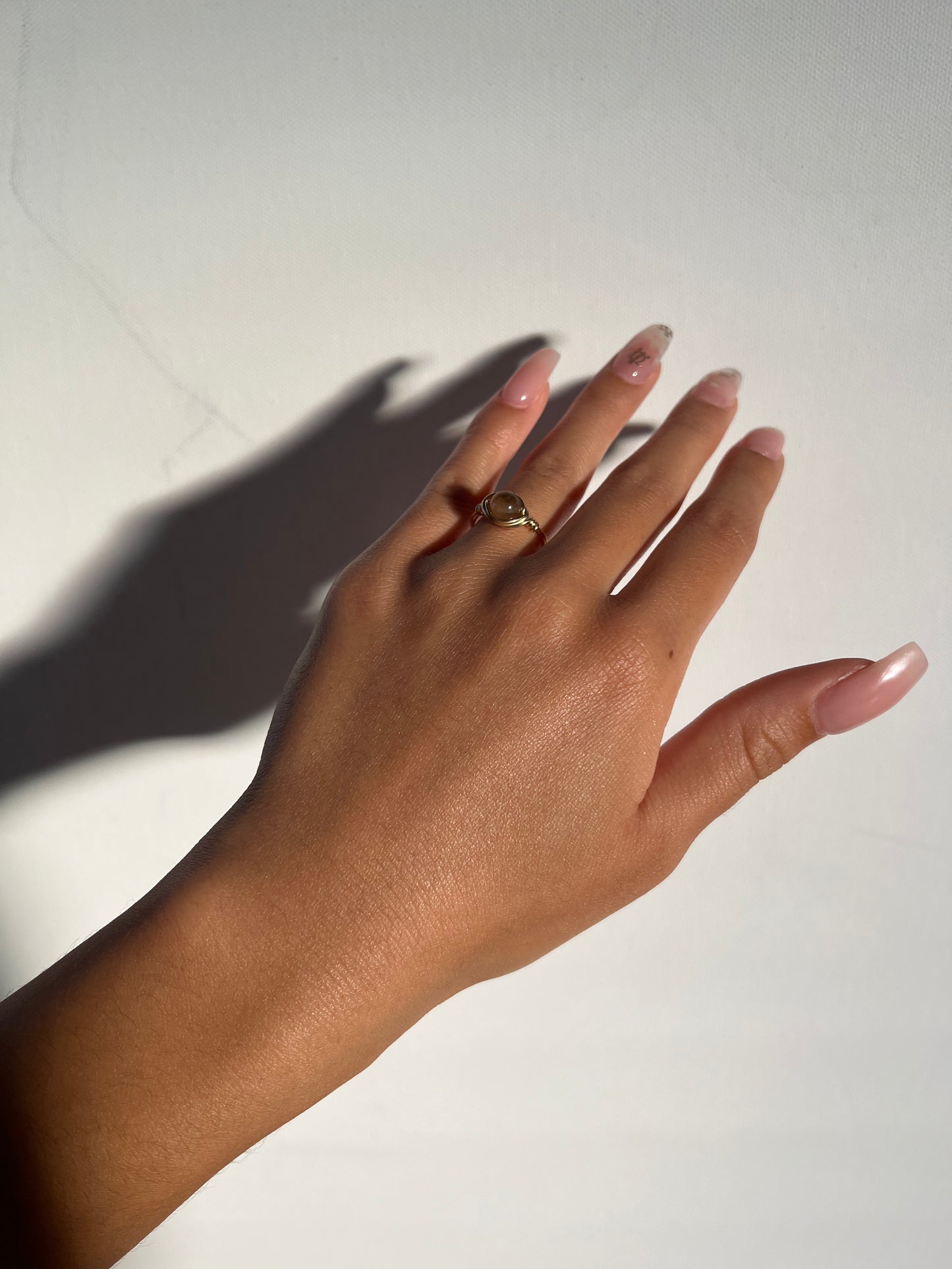 black sunstone ring