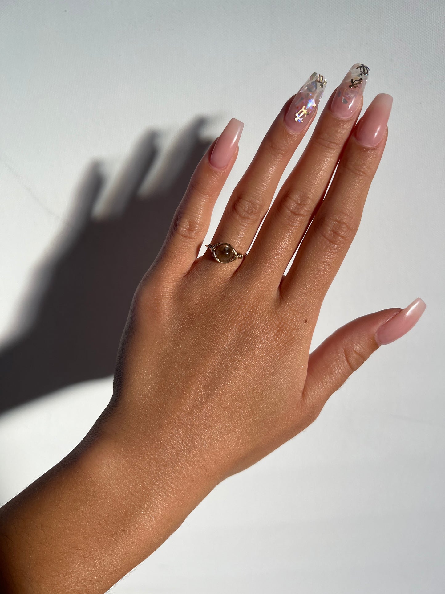 black sunstone ring