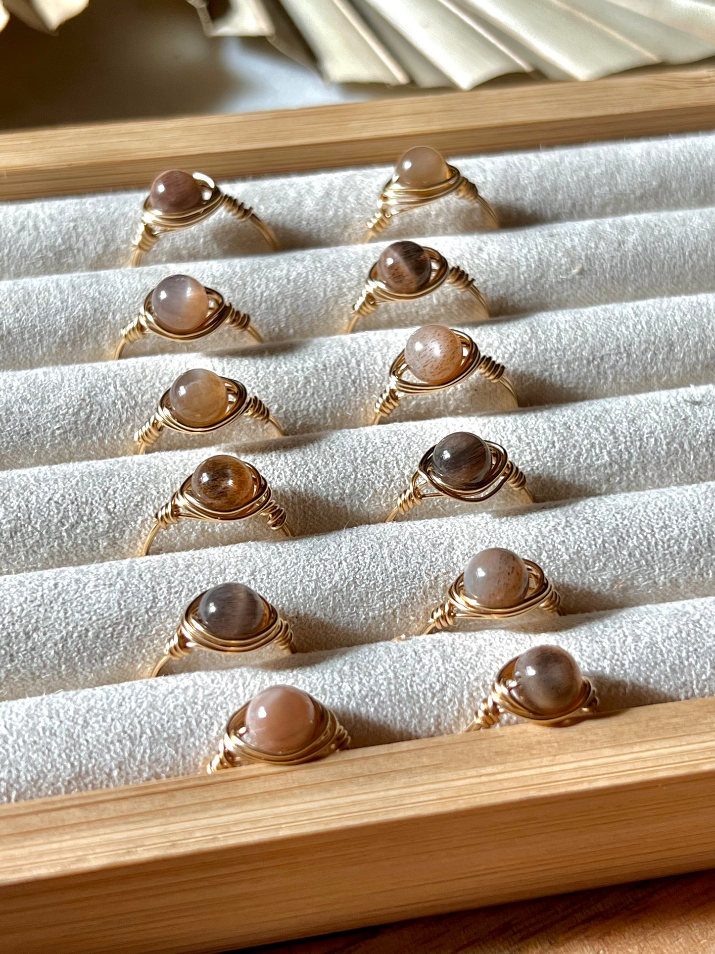 black sunstone ring